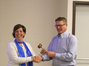 Outgoing Rotary Club of Fairview president Chris Laue (right) hands over the gavel to incoming president Shilo Wild. Laue thanked the club for the opportunity to be involved in the club and the community through the leadership position. He also thanked those who had helped him by chairing meetings when he was unable to attend due to work commitments. Knowing that somebody always had his back was a very positive part of his term in office.