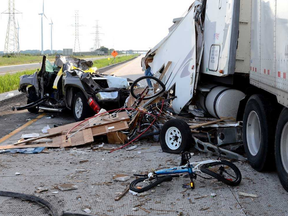 The aftermath of the crash on Highway 401 near Chatham that killed Lacie Brundritt, 42, and her son Kyle, 14, of Amherstburg, on July 30, 2017. The transport truck rear-ended the Brundritt family’s vehicle. (OPP photo)