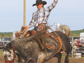 The Young Guns rodeo took place June 27 at the Arrowwood rodeo grounds. Here, Arrowwood’s Kole Ashbacher stays sturdy while competing in the saddle bronc June 27 during the Young Guns rodeo at the Arrowwood rodeo grounds.