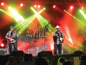 Photo by KEVIN McSHEFFREY/THE STANDARD
Green River Revival, a Creedance Clearwater Revival tribute band, was the headliner at the Uranium Heritage Festival’s Street Dance in Elliot Lake on Saturday night. It is estimated that more than 1,000 attended the street dance.