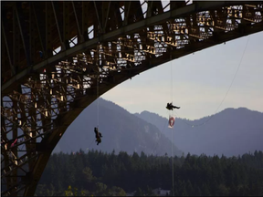 Anti-Trans Mountain protesters plan to rappel from Vancouver’s Ironworkers Memorial bridge as part of an aerial blockade of oil-tanker traffic on Tuesday morning.