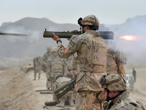 A Canadian Forces soldier fires an M72 light anti-tank weapon at the Kabul Military Training Centre range in Kabul, Afghanistan, on Nov. 4, 2013, during Operation Attention.  St. Norm McLean/Canadian Forces Combat Camera