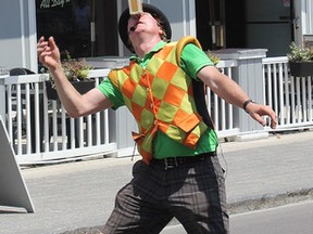 Circus Jonathan performs on Princess St. on Thursday July 6 2018, the first day of the Kingston Buskers Rendezvous for his fifth time at the Kingston Busker Rendezvous. Circus Jonathan was in Kingston for the first ever busker event 30 years ago.. Brigid Goulem/The Whig-Standard/