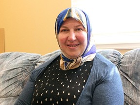 Bushra Sbahi, of Syria who has been in Kingston since 2015  at the Bath Rd. Baptist Church on Wednesday June 20, 2018. Sbahi has not seen her two sons, who are in South Korea, in years.  Brigid Goulem/The Whig-Standard/Postmedia Network