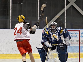 Duncan Carte moves in for a shot on goalie Bobby Morrison during a Brantford Warriors junior C lacrosse practice. Brantford will face Six Nations in a best-of-five semifinal series. (Brian Thompson/The Expositor)