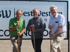 Morden mayor Ken Wiebe, owner Peter Klassen and Morden Community Development Corporation chair John Wiens broke ground on the Best Western site on July 4.