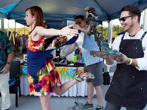 Global TV anchor Jennifer Crosby poses as a classic supernatural deity to help sell Sherwood Park artist Ryan Kurylo's sculpture at Pinot of the Patio at the Royal Glenora Club. The work raised $3,000 for CASA, which provides services to children, adolescents and their families with mental health issues.