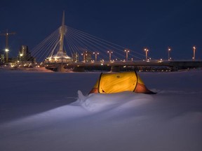 A brave soul apparently pitched a tent with a view of the Esplanade Riel in downtown Winnipeg. (ROSS PENNER/For The Winnipeg Sun)