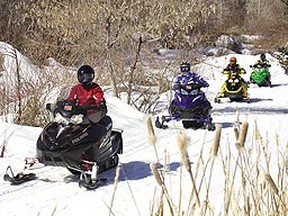 Sledders enjoying the well-maintained trails that the Ontario Federation of Snowmobile Clubs offers. (Courtesy Ontario Federation of Snowmobile Clubs)