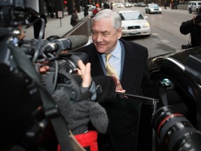 Conrad Black leaves the Federal Courthouse in Chicago after a status hearing, Jan. 13, 2011. (REUTERS files/John Gress)