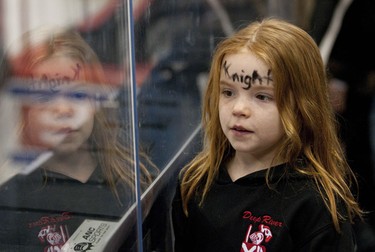 OTTAWA, Ont. (03/01/11)-- A young fan of the Deep River Knights watches the rink as the Knights play against the Smiths Falls Bears in an Atom House C championship game in Scotiabank Place, Monday, during the Bell Capital Cup. The Knights beat the Bears with a score of 5-0. Photo by Hadas Parush.