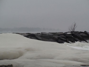 Snowbanks slowly receded from rocks at Britannia Beach on Jan. 1, a day of unseasonable warmth. (TONY SPEARS/Ottawa Sun)