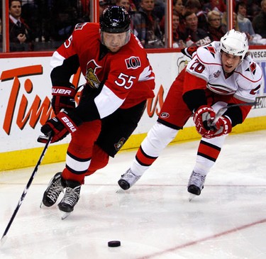 Ottawa Senators' Sergei Gonchar (55) escapes the pursuit of Carolina Hurricanes' Troy Bodie (20) during the second period of NHL action at Scotiabank Place Wednesday, December 29, 2010. (Darren Brown/Ottawa Sun)