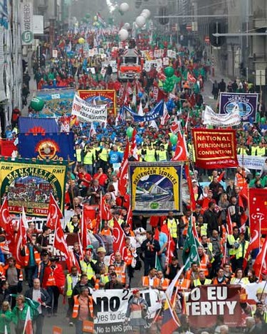 European workers and trade union representatives take part in the "No to austerity" protest to demand better job protection in Brussels September 29, 2010. About 100,000 people took to the streets of the Belgian capital in protest against the cost-cutting measures of euro zone governments.   (REUTERS)