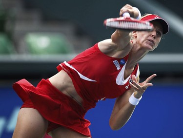 Elena Dementieva of Russia serves the ball to Flavia Pennetta of Italy during the Pan Pacific Open tennis tournament in Tokyo September 29, 2010.    REUTERS/Kim Kyung-Hoon