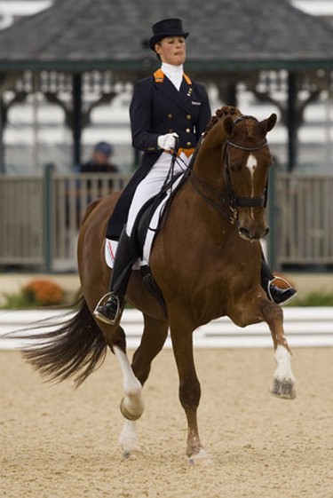 Adeline Cornelissen of Netherlands riding Jerich Parzival competes in the Grand Prix Dressage Championship at the World Equestrian Games in Lexington, Kentucky September 28, 2010. Cornelissen was eliminated from the competition because Jerich Rarzival was seen to be bleeding from the mouth.  REUTERS/Caren Firouz