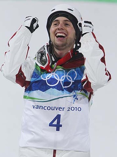 Alexandre Bilodeau from Montreal pumps his fists after winning Olympic gold at the men's moguls event in West Vancouver, B.C., on Sunday, Feb. 14, 2010. Photo by ANDRE FORGET/QMI AGENCY