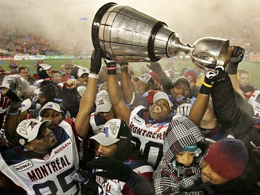 The Montreal Alouettes celebrate with teammates after winning the 98th Grey Cup held in Edmonton, Sunday, November 28, 2010. JORDAN VERLAGE/QMI AGENCY
