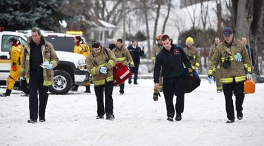 Emergency Services personnel leave the scene at Strathcona Park where efforts were made to rescue a nine year old boy from the Rideau River. Tuesday December 21,2010. (ERROL MCGIHON/THE OTTAWA SUN)