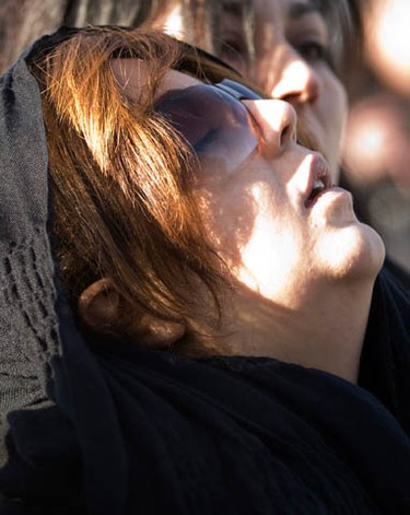 Negin, the mother of murder victim, Yazdan Ghiasi, weeps as her sons casket in loaded into the hearse outside the Ottawa Mosque Thursday, December 9, 2010.  (Darren Brown/Ottawa Sun)