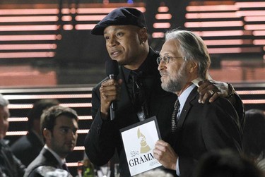 Host LL Cool J (L) and Recording Academy President Neil Portnow appear on The Grammy Nominations Concert Live - Countdown to the Music's Biggest Night event in Los Angeles December 1, 2010. The 53rd annual Grammy Awards will be presented February 13, 2011 in Los Angeles.  REUTERS/Mario Anzuoni