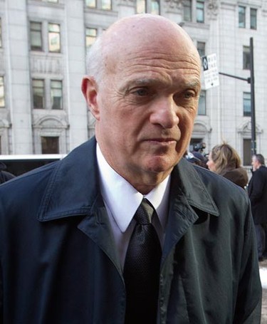 Lou Lamoriello, general manager of the New Jersey Devils, attends the funeral of former NHL coach Pat Burns in Montreal November 29, 2010. Burns, a tough-talking Quebec cop who coached the New Jersey Devils to a Stanley Cup and became the only man to win NHL coach of the year honours with three teams, died on Friday aged 58 after a long battle with cancer. (REUTERS/Christinne Muschi)