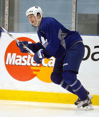 Colby Armstrong makes a move for the puck during Toronto Maple Leafs practice at the Mastercard Centre on Nov. 25, 2010. The Leafs head to unfriendly Buffalo Friday where they are a combined 25-54-6-2. (MICHAEL PEAKE, Toronto Sun)