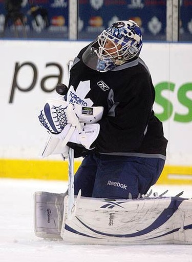 Giguere makes the save during Leafs practice at the Mastercard Centre on Nov. 25, 2010. Ron Wilson announced Jonas Gustavvson will start back-to-back games this weekend. (MICHAEL PEAK, Toronto Sun)