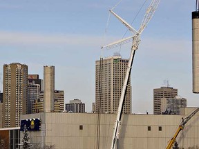 Crews take down the last smoke stack of the Rossdale Power Plant in Edmonton, Alta., on Saturday, November 20 2010. (AMBER BRACKEN/EDMONTON SUN)