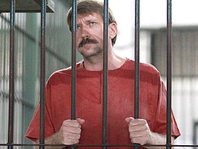 Viktor Bout stands in a holding cell after arriving at a Bangkok criminal court August 20, 2010. (Reuters)
