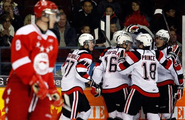 Ottawa 67s' celebrate their first goal against the Sault Ste. Marie Greyhounds during the first period of OHL action at the Civic Centre Sunday, November 14, 2010.   (Darren Brown/Ottawa Sun)