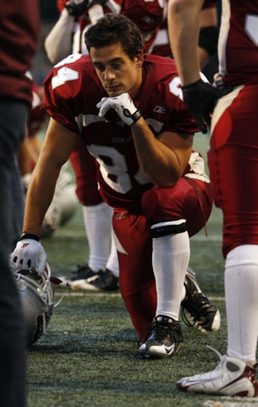 University of Ottawa GeeGees' QB Bogdan Raic stares at the ground after losing to the University of Western Ontario Mustangs in the OUA Championships at Frank Clair Stadium Saturday, November 13, 2010. (Darren Brown/Ottawa Sun)