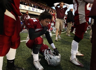 University of Ottawa GeeGees' Ugo Levesque takes a moment as his team attempts to hold off the University of Western Ontario Mustangs' during the fourth quarter of the OUA Championships at Frank Clair Stadium Saturday, November 13, 2010. (Darren Brown/Ottawa Sun)