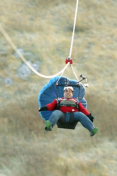 Calgary Mayor Naheed Nenshi goes down the Zip Line at Canada Olympic Park in Calgary on November 9,2010, the fastest zip line in North America for a future The Rick Mercer Report TV show. STUART DRYDEN/QMI AGENCY
