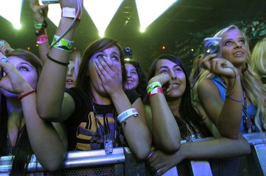 Fans react at the  Justin Bieber concert at John Labatt Centre Sunday night.  SUE REEVE The London Free Press