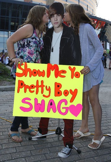 Aug 24/2010 Thousands of Justin Bieber fans gathered at Scotiabank Place in Ottawa Tuesday night to see their favorite teen idol perform. Caitlin Johnson and Emma Smith kiss a cut out figure of Justin before Tuesday's concert. The two friends from North Bay also saw Justin's concert in London last Sunday.  Tony Caldwell/Ottawa Sun