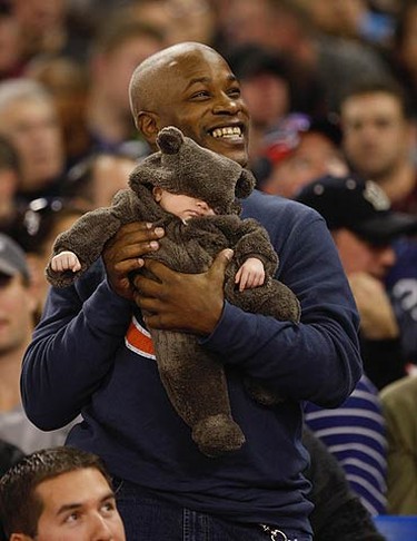 A Bears fan holds up his little "cub" hoping he might see him on the jumbotron. The Buffalo Bills and the Chicago Bears played an NFL game at the Rogers Centre in Toronto on Nov. 7, 2010. The Bears won 22-19. (CRAIG ROBERTSON, Toronto Sun)