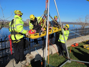 Ottawa Sun reporter Doug Hempstead gets "rescued" by Ottawa firefighters during a high-angle rescue exercise at Nepean Point on Tuesday, Nov. 2. Photo submitted by Stephen Brabazon