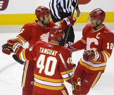 Calgary Flames, Mark Giordano, celebrates his goal on Detroit Red Wings goalie, Jimmy Howard, in first period action at the Scotiabank Saddledome in Calgary on Wednesday November 3, 2010.DARREN MAKOWICHUK/QMI AGENCY