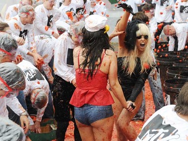 Lady Gaga and Katy Perry look-a-likes took part in MTV's Giant Tomato Fight held in Golden Square in London, on Nov. 11, 2010.  (WENN.com)