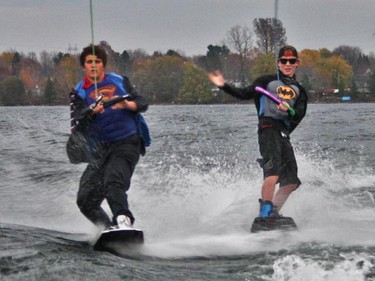 Competitive wakeboarder Timothy McNamee (dressed as the Smiths Falls Bear) and friends Ben Merkley and Mitch Harrow got out their costumes and wakeboards for a frigid and fun stunt -- a fall run on the water. They're all experienced 'boarders out of Len's Cove Marina in Portland. In part, the stunt in the 53 degree F water was to celebrate Timothy's birthday, and she wants to turn it into an annual event for area enthusiasts. Friend Brady Rodgers took the photos.