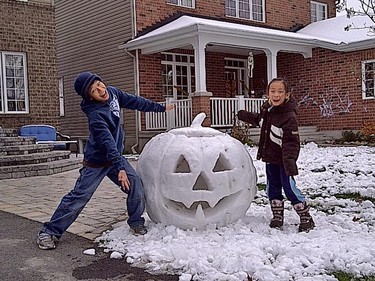 The Cheer family in Kanata put together a last-minute Halloween pumpkin from the snowfall Saturday night. The, on Halloween night, they lit it brightly. The photos were submitted by Trever Eggleton. Submit photos of your Halloween display and we might use them in our gallery. Remember to include your name and street. To submit a photo go to the ottawasun.com homepage and click Your Scoop.