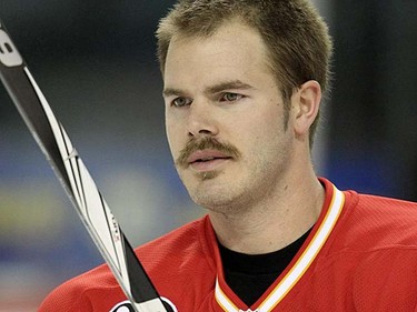The moustache has helped give Calgary Flames defenceman Ian White a boost to his NHL career. (QMI Agency/Al Charest)