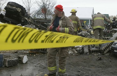 Damage is estimated at $1.1 million after an early-morning fire tore through a pair of auto-body shops in a single building in Vanier Sunday.
DOUG HEMPSTEAD/Ottawa Sun