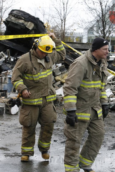 Damage is estimated at $1.1 million after an early-morning fire tore through a pair of auto-body shops in a single building in Vanier Sunday.
DOUG HEMPSTEAD/Ottawa Sun