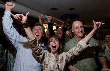 Mary-Margaret McMahon celebrates at her headquarters after learning she had defeated incumbent Sandra Bussin in Ward 32 by a landslide. (STAN BEHAL, Toronto Sun)