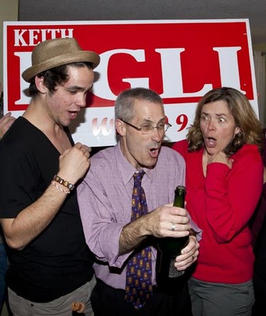 Keith Egli celebrates his election victory in Knoxdale-Merivale Ward with some champagne alongside his wife Kristen Douglas (R) and one of his sons Ben (L) Monday, October 25,2010. (ERROL MCGIHON/THE OTTAWA SUN)