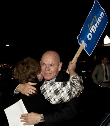 Ottawa Mayor Larry O'Brien hugs a supporter as he arrives at his election night gathering. O'Brien was defeated by Jim Watson. Monday October 25, 2010. (ERROL MCGIHON/THE OTTAWA SUN)