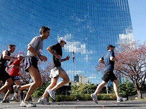 Runners make their way up University Ave. during the Goodlife Fitness Marathon/Half Marathon in Toronto on Oct. 17, 2010. (DAVE ABEL, Toronto Sun)