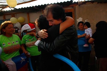 Rescued Chilean miner Victor Segovia (front R) hugs a relative as he arrives at his home after being discharged from Copiapo Hospital, two day after he was rescued from the San Jose mine in Copiapo on Oct. 15, 2010. Chile's rescued miners headed home on Friday as heroes after an ordeal deep underground during which they drank oil-contaminated water and set off explosives in a desperate bid to alert rescuers. (REUTERS)